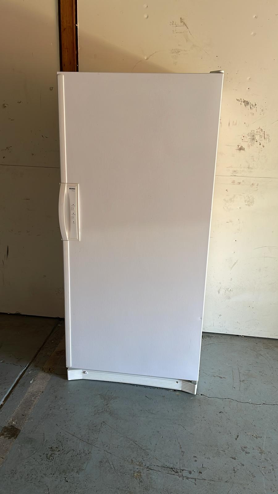 Real upright freezer photo from our appliance collection for pickup condition review