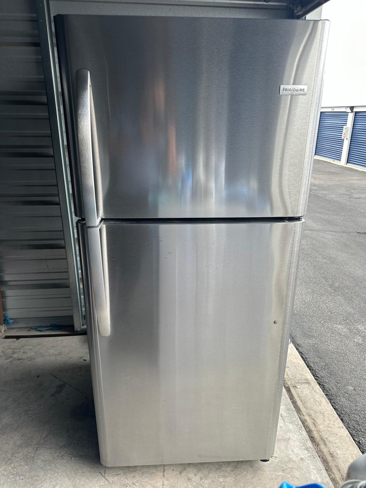 Real refrigerator photo from our appliance collection for pickup condition review