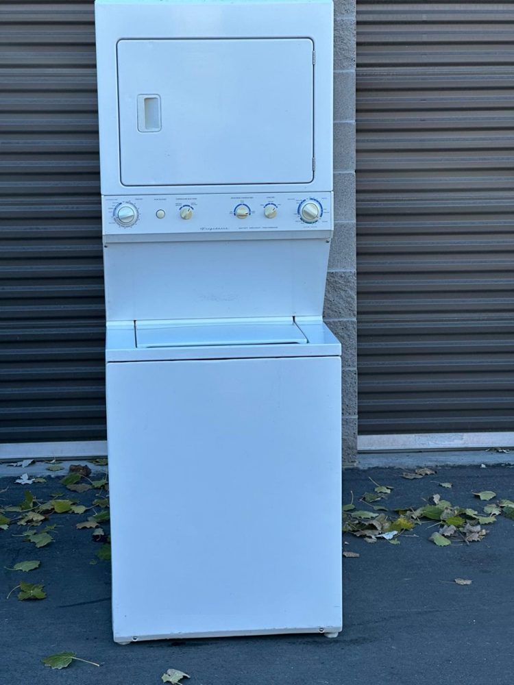 Stacked washer and dryer laundry center